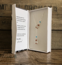 Load image into Gallery viewer, Saddle Stirrup Necklace w/AQUA Bead
