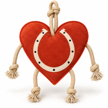 Load image into Gallery viewer, Clean studio-style image of Heart/horseshoe toy
