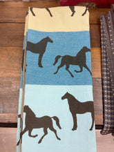 Load image into Gallery viewer, Michaelian Home Equus Kitchen Towel Blue, cream blue aqua bands with dark horse silhouettes
